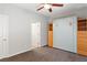 Neutral bedroom with a Murphy bed and a door to an ensuite at 2091 Hunt Woods Ct, Laughlin, NV 89029