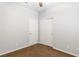 This is a bedroom featuring carpet flooring, ceiling fan, and two closets at 2091 Hunt Woods Ct, Laughlin, NV 89029