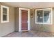 Inviting front porch with brick flooring, decorative lighting, and charming 'Home Sweet Home' welcome mat at 2091 Hunt Woods Ct, Laughlin, NV 89029