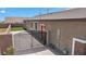 Angle view features a turf lawn, hardscape, backyard gate and exterior door at 2091 Hunt Woods Ct, Laughlin, NV 89029
