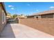 Property featuring a block wall, ideal for privacy, and a spacious extended driveway for vehicles at 2091 Hunt Woods Ct, Laughlin, NV 89029