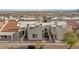 Aerial view of the community showcasing the red tile roofs, desert landscaping, and mountain views at 2146 High Dunes Ln, Laughlin, NV 89029
