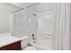 Clean bathroom featuring a shower-tub combination with tiled walls and neutral decor at 2146 High Dunes Ln, Laughlin, NV 89029