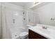 A clean bathroom with a shower-tub combo, toilet, and vanity at 2146 High Dunes Ln, Laughlin, NV 89029