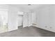 A bedroom with gray carpet, white walls, and closet at 2146 High Dunes Ln, Laughlin, NV 89029