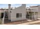 Charming townhome with desert landscaping, a covered front porch, and a fenced yard at 2146 High Dunes Ln, Laughlin, NV 89029