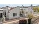 Well-maintained townhome featuring desert landscaping, red tile roofs, and fully fenced yards at 2146 High Dunes Ln, Laughlin, NV 89029