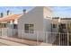 Charming townhome featuring a fenced yard, desert landscaping, and a well-maintained stucco exterior at 2146 High Dunes Ln, Laughlin, NV 89029