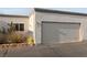 Attached one-car garage with desert landscaping in a Las Vegas neighborhood at 2146 High Dunes Ln, Laughlin, NV 89029