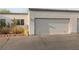 Attached one-car garage with desert landscaping in a Las Vegas neighborhood at 2146 High Dunes Ln, Laughlin, NV 89029