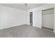 Bright bedroom with sliding closet, carpet flooring and natural lighting provides ample storage at 2716 Saber Dr, North Las Vegas, NV 89032