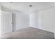 Bright bedroom with carpet flooring, neutral walls, and a door creates a relaxing atmosphere at 2716 Saber Dr, North Las Vegas, NV 89032