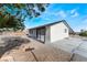 Angle view of a home with gravel landscaping and a freshly painted exterior at 2716 Saber Dr, North Las Vegas, NV 89032