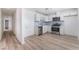 Modern kitchen featuring stainless steel appliances and bright white cabinets at 2716 Saber Dr, North Las Vegas, NV 89032