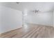 Spacious living room featuring sleek light wood floors and lots of natural light at 2716 Saber Dr, North Las Vegas, NV 89032