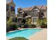 View of a community pool, showing multiple residential building in the background at 2787 Fountain Ridge Ln, Henderson, NV 89074