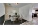 Cozy dining area with a modern table setting and easy access to kitchen appliances at 2787 Fountain Ridge Ln, Henderson, NV 89074