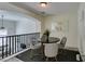 Dining space overlooking the living room with modern chairs and contemporary decor at 2787 Fountain Ridge Ln, Henderson, NV 89074