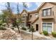Charming townhouse featuring desert landscaping, a private balcony, and a well-maintained exterior at 2787 Fountain Ridge Ln, Henderson, NV 89074