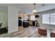 Well-lit kitchen boasts stainless appliances, granite counters, and a central island at 2787 Fountain Ridge Ln, Henderson, NV 89074