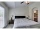 Primary bedroom with an ensuite bath, walk-in closet, and neutral decor at 2787 Fountain Ridge Ln, Henderson, NV 89074