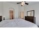Primary bedroom featuring ensuite bathroom, neutral decor, and bright lighting at 2787 Fountain Ridge Ln, Henderson, NV 89074