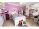 Charming bedroom featuring a comfortable bed and playful decor for a cozy atmosphere at 3041 Hammerwood Dr, Las Vegas, NV 89135