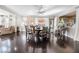 Spacious dining area with hardwood floors and large windows for lots of light at 3041 Hammerwood Dr, Las Vegas, NV 89135
