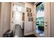 Hallway leading to the laundry room with access to the backyard at 3041 Hammerwood Dr, Las Vegas, NV 89135