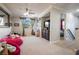 Large living area with carpet and a window with backyard views at 3041 Hammerwood Dr, Las Vegas, NV 89135