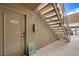 Apartment entrance featuring the door to unit 1192 and stairway access at 3151 Soaring Gulls Dr # 1192, Las Vegas, NV 89128