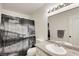 Clean bathroom with shower-tub combo, neutral colors and a granite countertop at 3151 Soaring Gulls Dr # 1192, Las Vegas, NV 89128