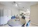 Open dining area with white accents, updated lighting, and room for seating at 3151 Soaring Gulls Dr # 1192, Las Vegas, NV 89128