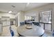 Bright dining area adjacent to kitchen and living room with nice flooring and natural light at 3151 Soaring Gulls Dr # 1192, Las Vegas, NV 89128