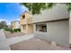 Condo exterior showing multiple units with low-maintenance landscaping and walkways at 3151 Soaring Gulls Dr # 1192, Las Vegas, NV 89128