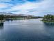 Scenic lake view with lush greenery and serene waters, offering a peaceful and picturesque residential setting at 3151 Soaring Gulls Dr # 1192, Las Vegas, NV 89128