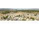 An aerial view of a residential community showcases the neighborhood's layout and surrounding landscape at 367 Lander Dr, Henderson, NV 89074
