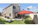 Backyard with green grass, patio, and privacy fence at 367 Lander Dr, Henderson, NV 89074
