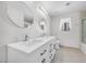 This bathroom includes dual sinks, great counter space and lighting at 367 Lander Dr, Henderson, NV 89074