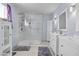 This updated bathroom boasts a glass enclosed shower and double vanity at 367 Lander Dr, Henderson, NV 89074