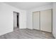 Bright bedroom with wood-look floors and closet at 367 Lander Dr, Henderson, NV 89074