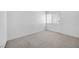 Bedroom with neutral carpet and a window at 367 Lander Dr, Henderson, NV 89074