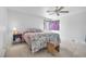 This cozy bedroom features a ceiling fan, neutral carpet, and comfortable furnishings at 367 Lander Dr, Henderson, NV 89074