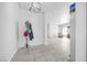Entryway and main living space is tiled and neutrally decorated at 367 Lander Dr, Henderson, NV 89074
