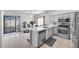 Open kitchen featuring a peninsula with a sink and access to the backyard at 367 Lander Dr, Henderson, NV 89074