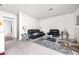 Comfortable living room with tile floors, neutral walls, and access to other areas at 367 Lander Dr, Henderson, NV 89074
