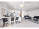 Open-concept kitchen and living area with a breakfast bar and comfortable seating at 367 Lander Dr, Henderson, NV 89074