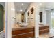 Modern bathroom with double sinks, wood cabinets, and stylish decor, very spacious at 3722 Las Vegas Blvd # 1908, Las Vegas, NV 89158