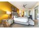 Cozy bedroom featuring a comfortable bed, city views, decorative lighting, and neutral colors at 3722 Las Vegas Blvd # 1908, Las Vegas, NV 89158