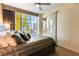 Comfortable bedroom with large windows and city views, offering a relaxing space at 3722 Las Vegas Blvd # 1908, Las Vegas, NV 89158